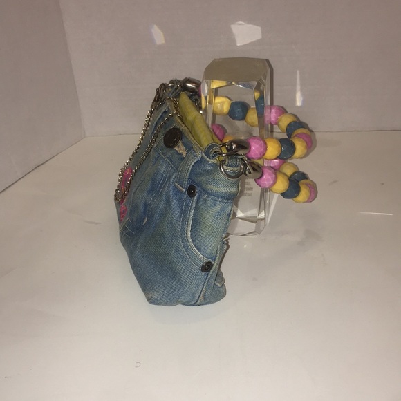 Preowned denim purse with beaded handles and peace patches. - Picture 4 of 7